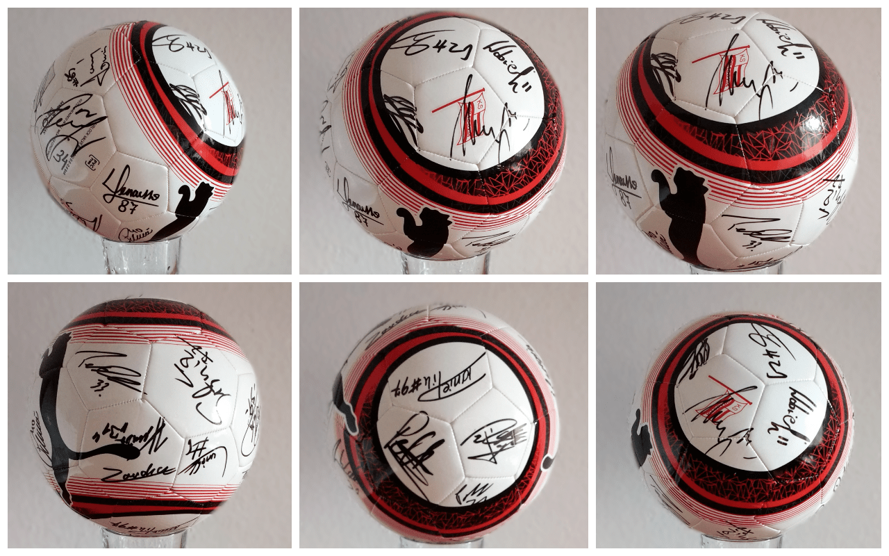 Piłka z autografami podpisami piłkarzy Cracovii